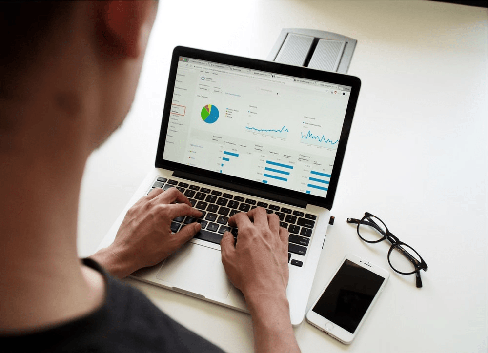 SEO expert working on laptop