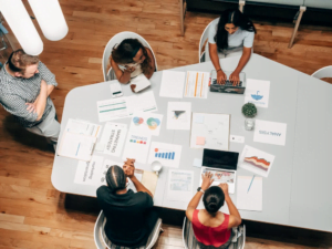 Employees at a digital marketing agency creating a PPC campaign