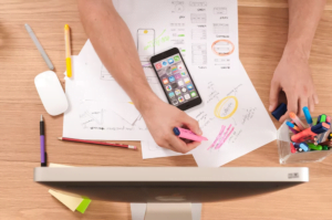 A marketer creating a detailed marketing strategy