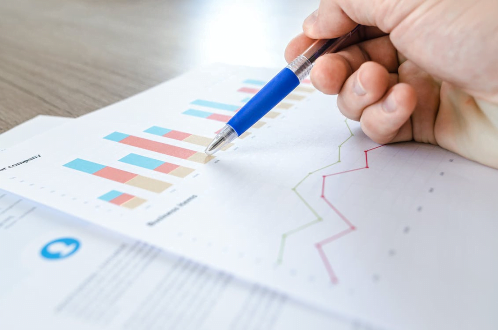 Person analyzing data insights from charts