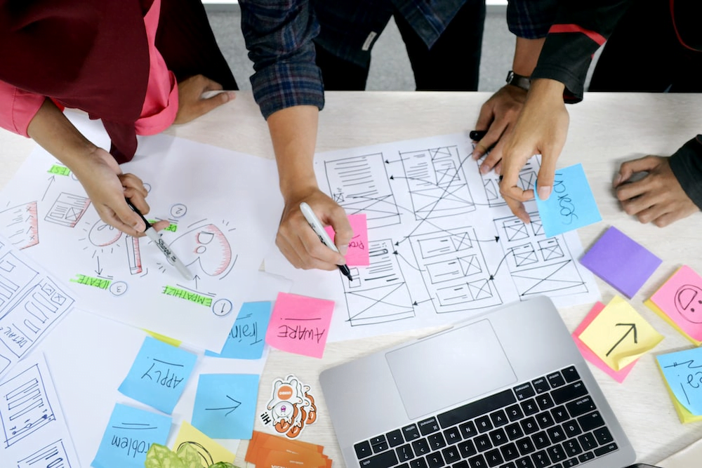 professionals working on a website redesign plan