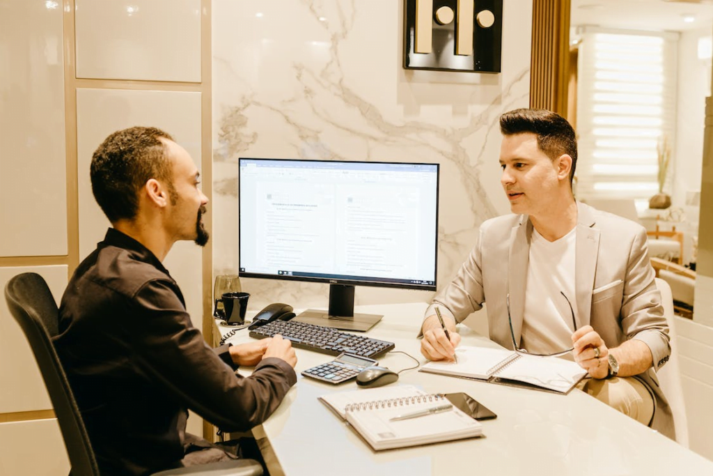graphic designer discussing white-label agency tools to improve SERPs of a website