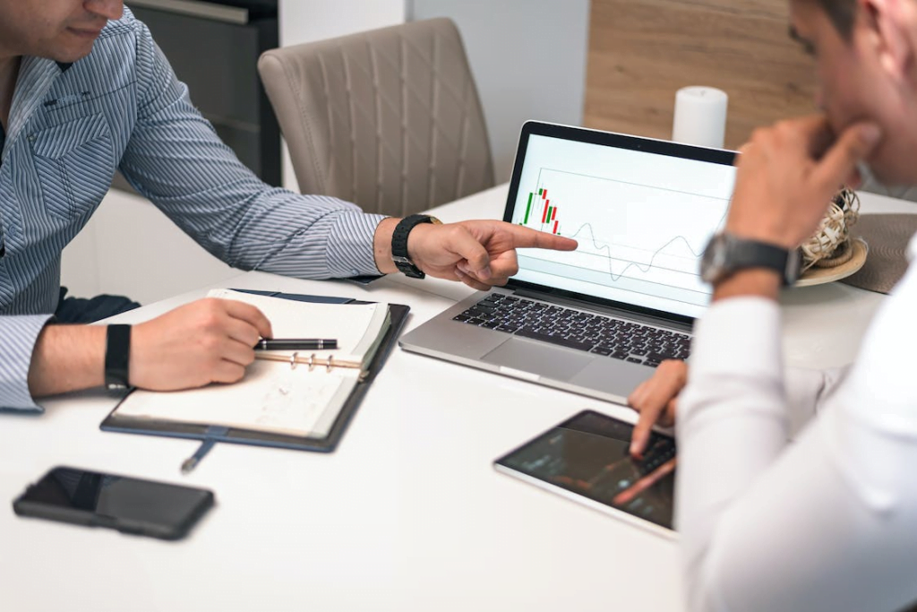 professional at a white-label reseller agency discussing progress with an agency client