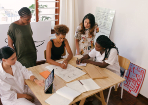 Content strategists meeting a client at the white-label reseller agency