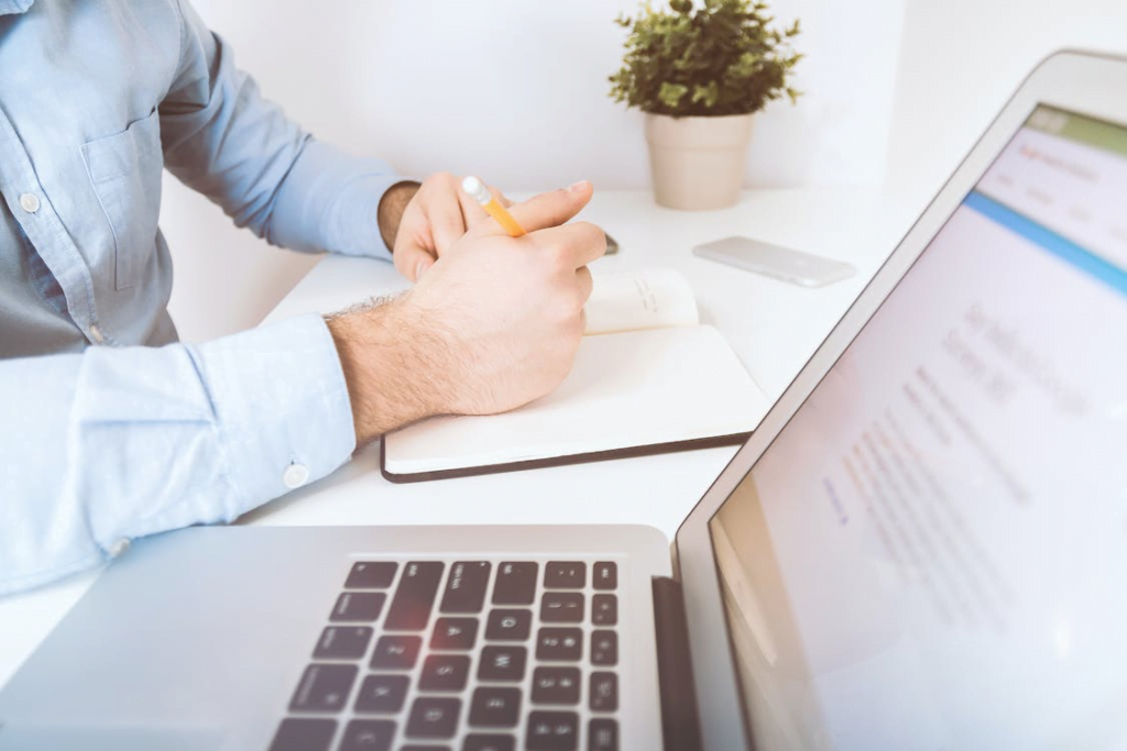 content writer noting insights to use in the blogs
