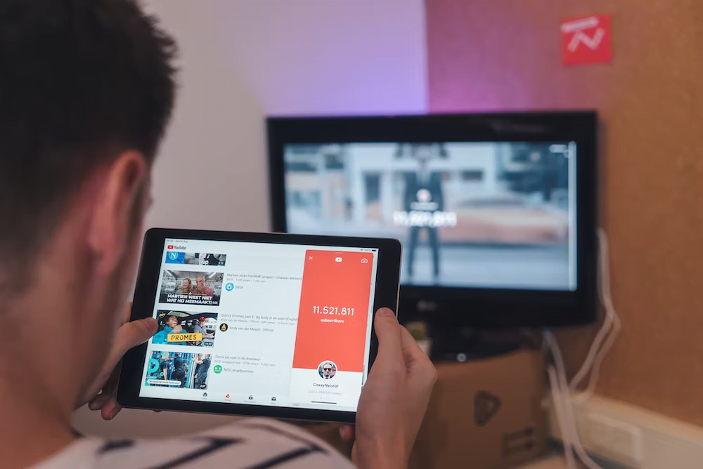 A person viewing YouTube on their iPad