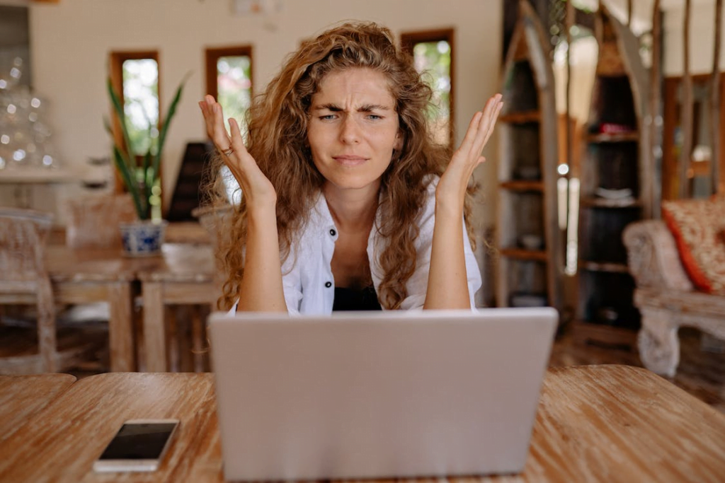 woman frustrated by a slow-loading website