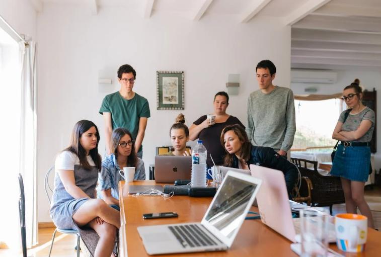 A group of marketing specialists is working in an office