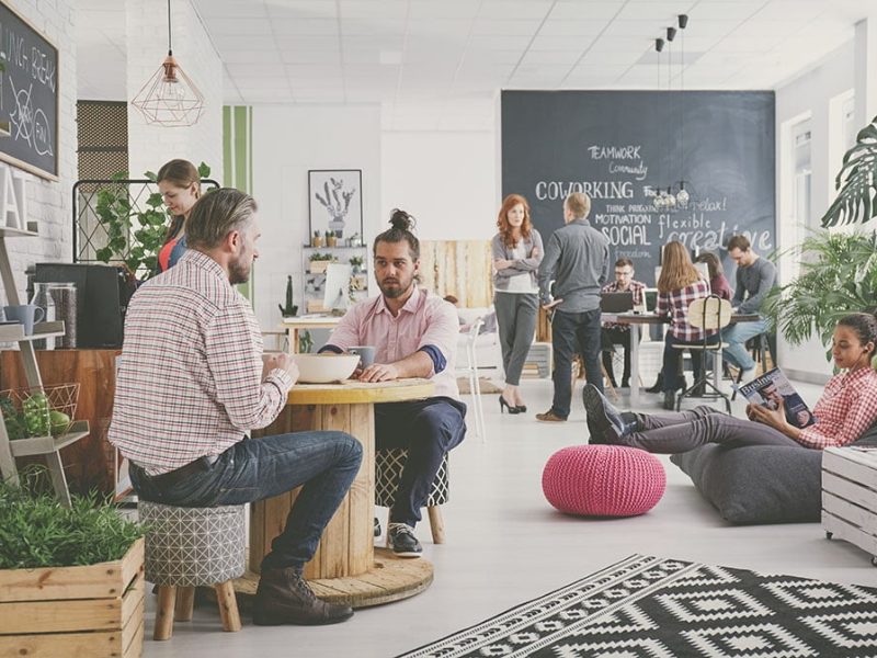 Marketing agency workers having coffee break at comfortable relax zone